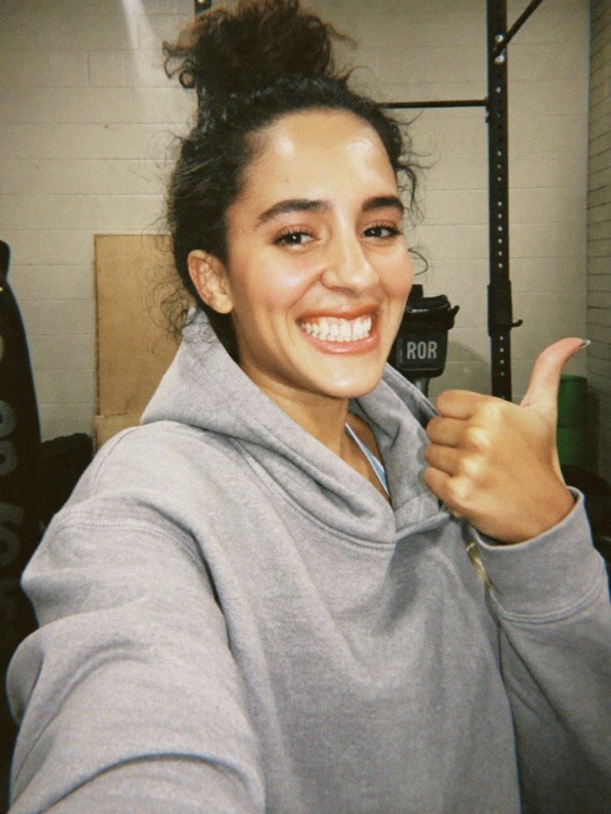 Post-workout selfie with a thumbs up